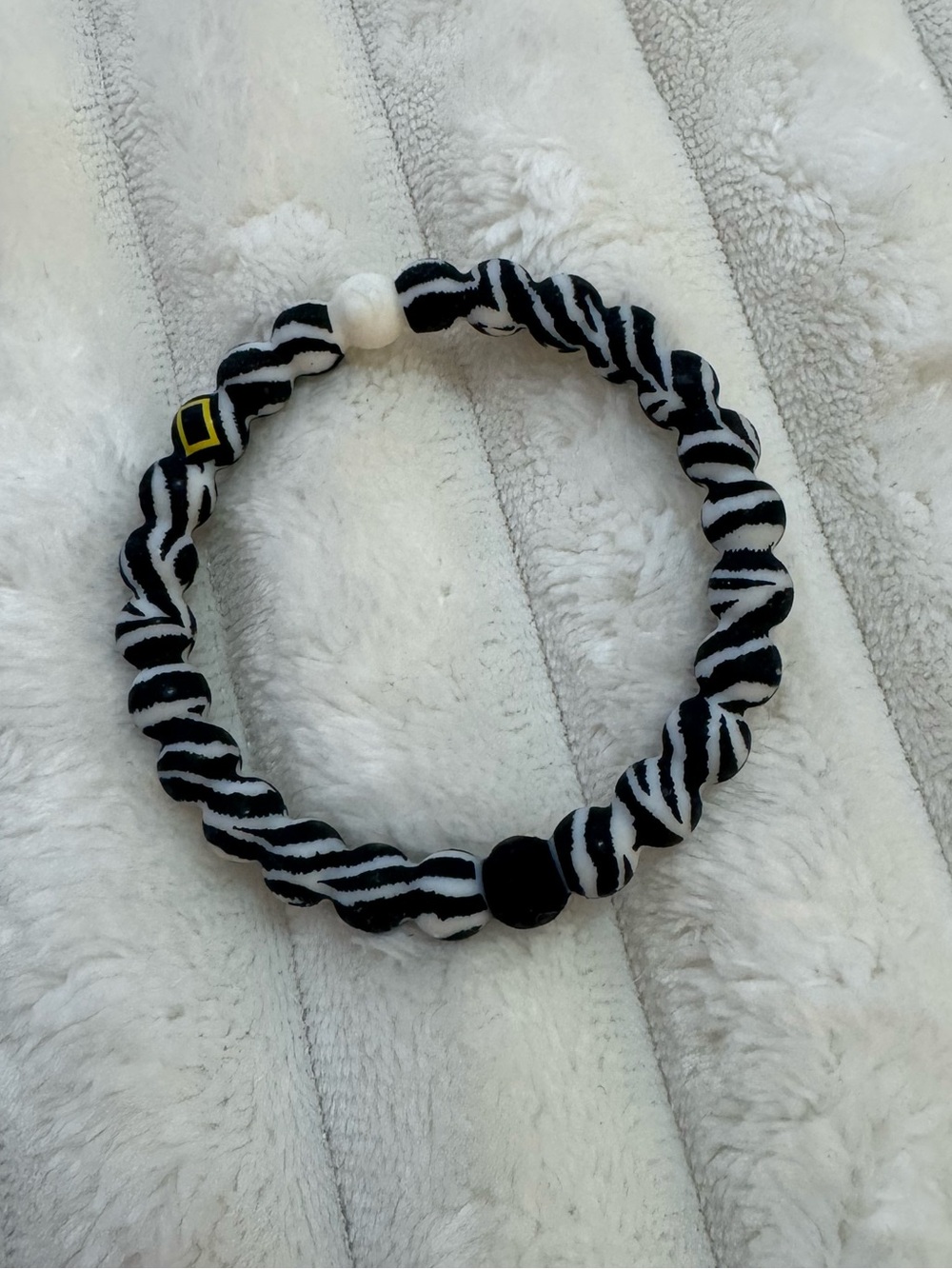 National Geographic x Lokai zebra print braclet